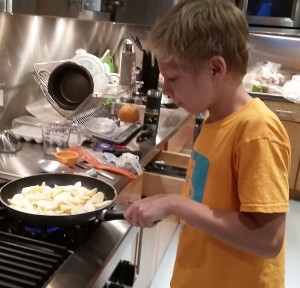 Max cooking apples in butter, sugar and cinnamon