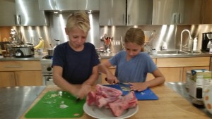 Chopping garlic for lamb shank braise