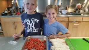 Parmesan crusted chicken and grape tomatoes about to go in the oven.