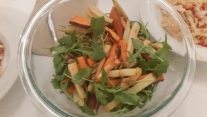 Argula salad with root vegetable fries and pepitas.