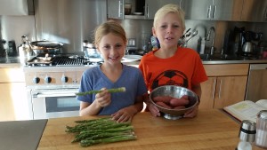 Snapping asparagus stems.. cleaning fingerling potatoes