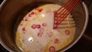 Alex cooking her coconut milk shrimp