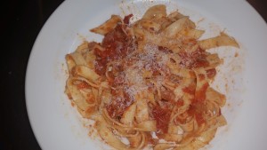 Home-made pasta with 'Amatricano sauce (i.e. pancetta/onion/tomato)