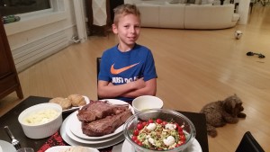 The full dinner: steak, potatoes and salad (and Koko hoping for a handout)