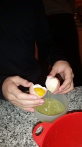 Separating yolk from white.
