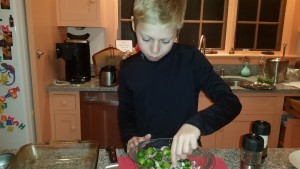 Stirring red onions and brussel sprouts together