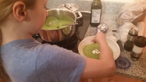 Plating the soup. 